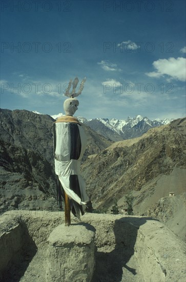 INDIA, Zanskar, Karsha Gompa, Figure of guardian of death on monastery roof.