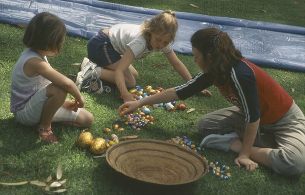 AUSTRALIA, Western Australia, Mandurah, Children on Easter egg hunt.