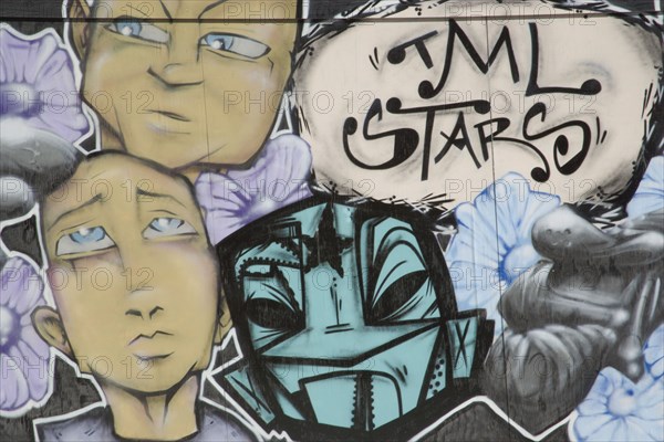 ENGLAND, East Sussex, Brighton, Colourful graffiti on wall.