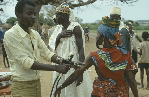 MALI, Health, Woman being given innoculation.