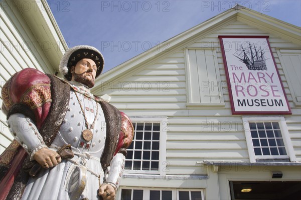 ENGLAND, Hampshire, Portsmouth, Statue of King Henry VIII outside the Mary Rose Museum in The Historic Naval Dockyard.