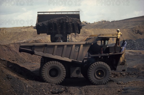 GABON, Moanda, Loading large truck at manganese mine.