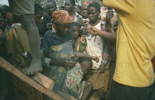 BURUNDI, Refugees, Mass transportation of Hutu refugees in overcrowded UN trucks.