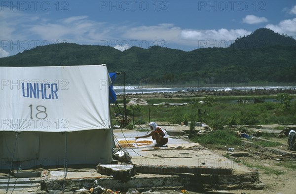 INDONESIA, Tsunami, Aceh Province, Displaced peoples camp after December 2004. UNHCR tent in the foreground.
