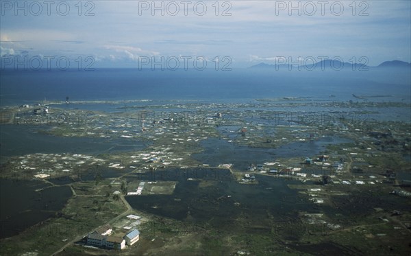 INDONESIA, Tsunami, Aceh Province, "Aerial shot looking down on flooded Banda Aceh, 5 months after December 2004."