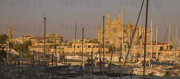 SPAIN, Balearic Islands, Mallorca, "Palma de Mallorca, Panoramic view of The Cathedral across the port."