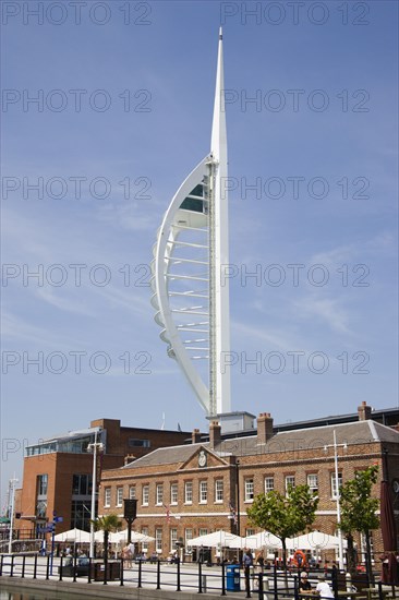 ENGLAND, Hampshire, Portsmouth, The Spinnaker Tower the tallest public viewing platforn in the UK at 170 metres on Gunwharf Quay with the old Customs House in the foreground