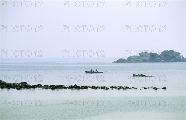 NORTH KOREA, East Coast, Tongjoson Bay, Distant fishing boat.