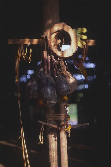 VENEZUELA, Vaupes , Traditional Tukano indian head-dress and maracas.