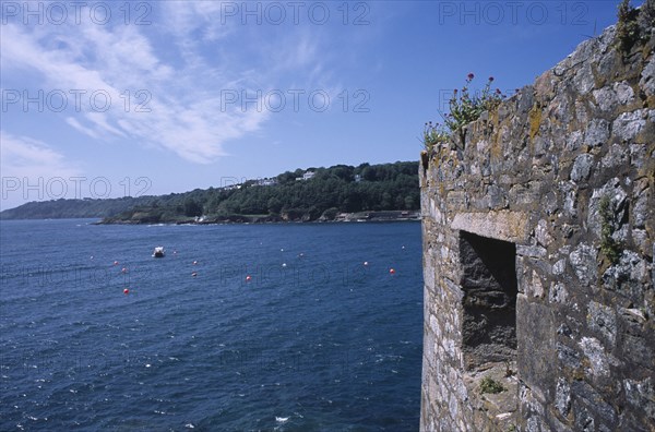 UNITED KINGDOM, Channel Islands, Guernsey, St Peter Port. Castle Cornet with part view of wall and sea.