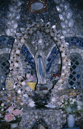 UNITED KINGDOM, Channel Islands, Guernsey, Les Vauxbelets. The Little Chapel. Interior with detail of shrine.