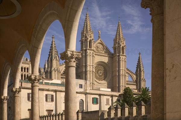 SPAIN, Balearic Islands, Mallorca, "Palma de Mallorca, View of the Cathedral from under a row of arches."