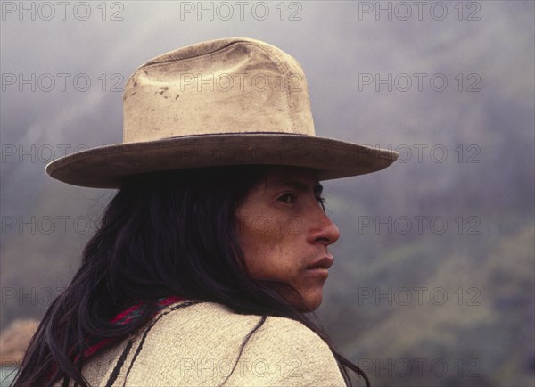 COLOMBIA, Santa Marta, Sierra Nevada , "Ica Indian chewing coca, wearing a hat and looking to his right."