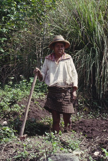 GUATEMALA, Solola, Campesino preparing land for cultivation.