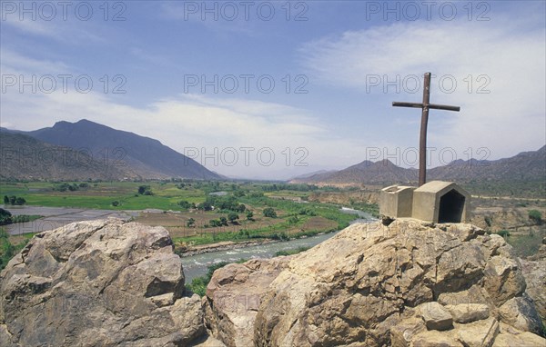 PERU, Northern, "Road side cross, with river and flood plain in back-ground on road from Cajamarca to Chiclayo. "