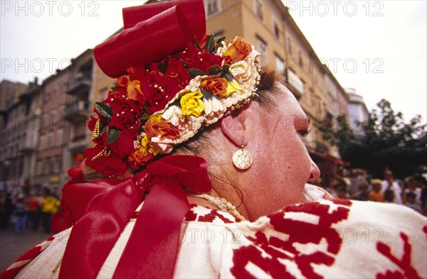 CROATIA, Kvarner, Rijeka, "Habsburg jubilee, woman in traditional hat. The streets of Rijeka are a riot of colour during the celebrations of the city's Habsburg heritage"