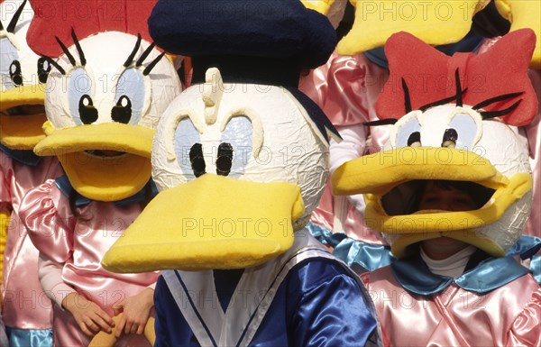 CROATIA, Kvarner, Rijeka, "Mask carnival, Donald and Daisy duck masks The Masked carnival (Maskare) held on the Sunday before Ash wednesday floods the streets of Rijeka with thousands of masked and costumed revellers, rivalling its great counterpart in Venice"
