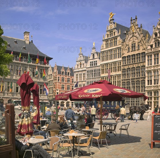 BELGIUM, Flemish Region, Antwerp., "Cafe in Grote Markt, Main Square with a horse and carriage behind."