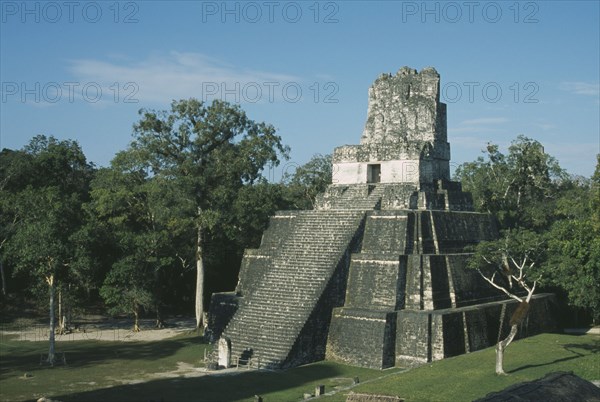 GUATEMALA, El Peten, Tikal, "Mayan Ruins, 200BC to 900AD. Temple II, Temple of the Masks, 38 Meters. Great Plaza."