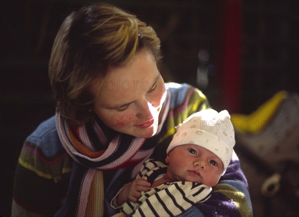 ENGLAND, Dorest, Mother with newly born son.