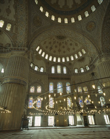 TURKEY, Istanbul, "Interior of Blue Mosque of Sultan Ahmet. Dome roof, stained glass windows and large chandelier"