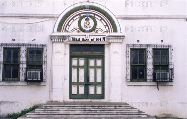 BELIZE, Belize City, Front of the central bank with steps leading up to the front door and windows either side.