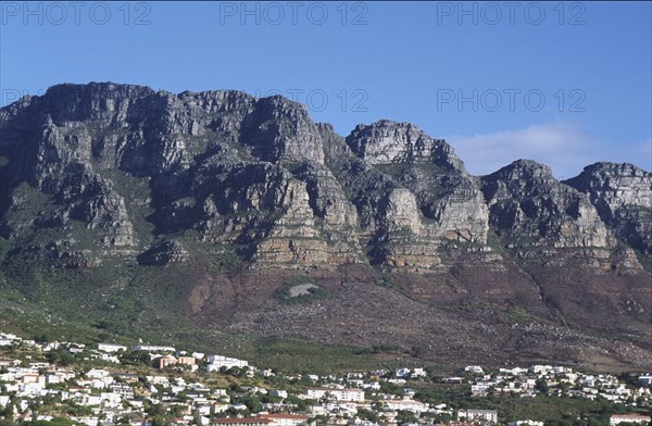 SOUTH AFRICA, Western Cape, Cape Town, "Camps Bay residential area, with the Apostles in back-ground."