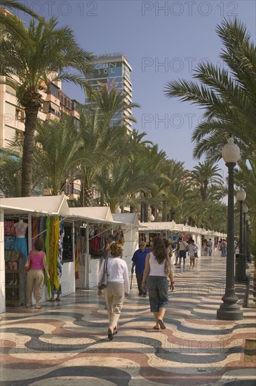 SPAIN, Costa Blanca, Alicante, The Explanada de Espana. People walking past shops.