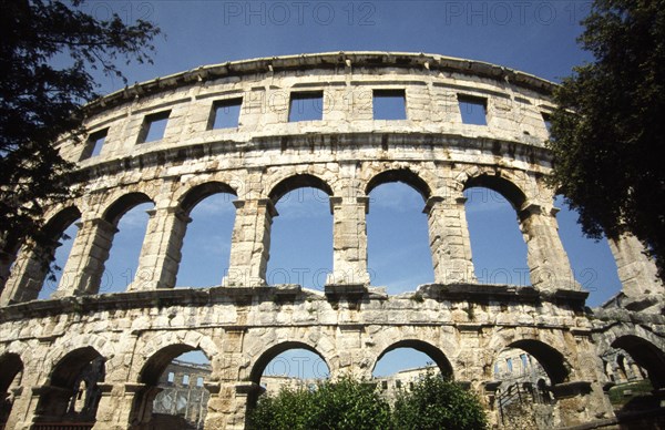 CROATIA, Istria, Pula, "Roman Arena built at the end of the first century BC, Pula's Roman Arena is the sixth largest in the world, able to capacitate 22,000 spectators. Today it retains its purpose as a venue for entertainment, housing a series of summer concerts every year"