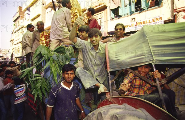 INDIA, Rajasthan, Udaipur, "Durga procession, the tenth day of the Dussehra festival, which is celebrated across most of northern India, is marked by processions of the Hindu Goddess Durga with effigies of the deity held aloft on the back of open trucks and paraded through the streets"