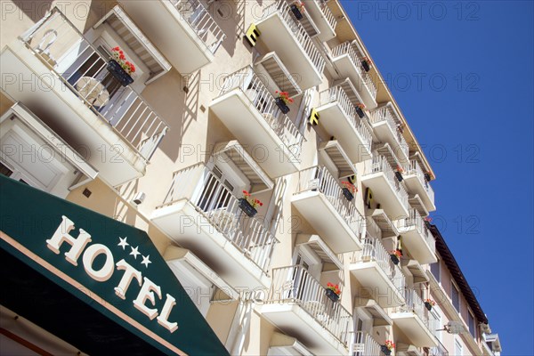 FRANCE, Aquitaine Pyrenees Atlantique, Biarritz, The Basque seaside resort on the Atlantic coast. Three star hotel sign and balconies