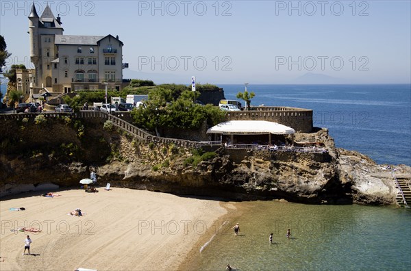 FRANCE, Aquitaine Pyrenees Atlantique, Biarritz, The Basque seaside resort on the Atlantic coast. The Plage de Port-Vieux with a seafood restaurant on a promontory at the end of the beach