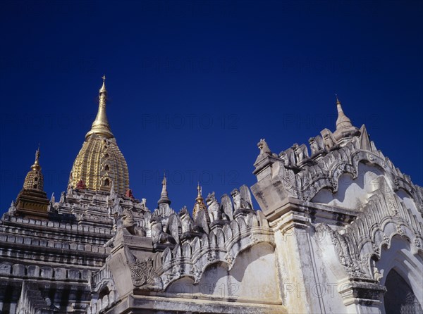 MYANMAR, Bagan, Part view of exterior of Ananda Pahto in old ruined city.  The first of Bagan’s great temples (c. 1090-1105) in Mon architectural style with North Indian influence.