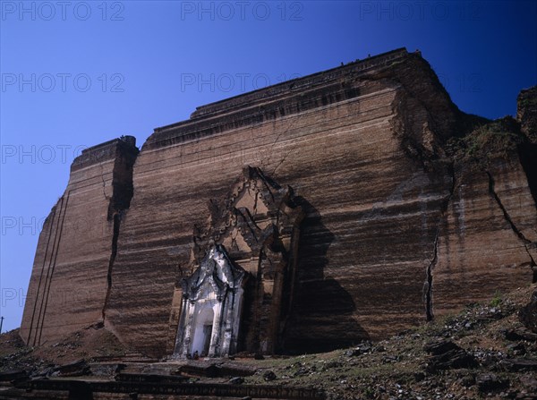 MYANMAR, Mingun, Mingun Paya exterior facade of unfinished pagoda begun in 1790 which suffered earthquake damage in 1938.