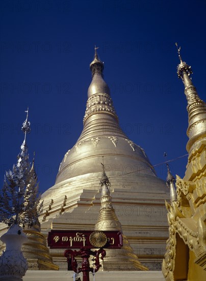 MYANMAR, Yangon, Shwedagon Paya.  Golden exterior of main stupa.