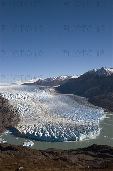 CHILE, Southern Patagonia, Southern Ice fields , Early morning view of Glacier O'Higgins with the Southern Ice fields (Hielo Sur) in the background. Trek from Glacier Chico (Chile) to El Chalten (Argentina)