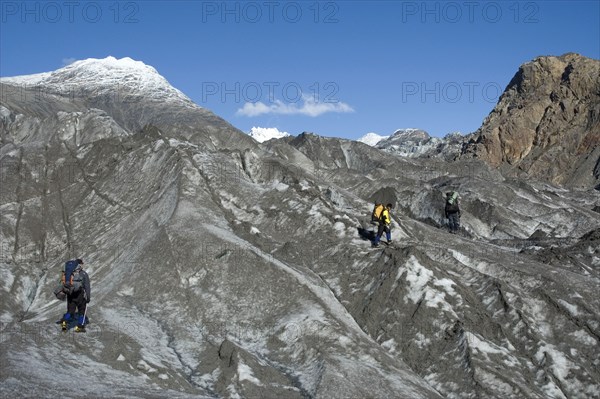 CHILE, Southern Patagonia, O'Higgins region , Mountaineers crossing Glacier Chico in the O'Higgins region of Patagonia. Trek from Glacier Chico (Chile) to El Chalten (Argentina)