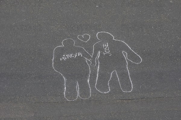VENEZUELA, Caracas, Chalk outlines with the names of participants in an event on Avenida Francisco de Miranda to protest increasing levels of violence.