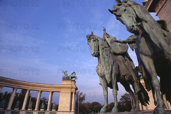 HUNGARY, Budapest, Heroes  Square erected to mark the 1000th anniversary of the Magyar conquest.  Part view of equestrian statues on the Millennary Monument. Eastern Europe