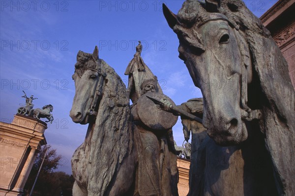 HUNGARY, Budapest, Heroes  Square erected to mark the 1000th anniversary of the Magyar conquest.  Part view of equestrian statues on the Millennary Monument. Eastern Europe