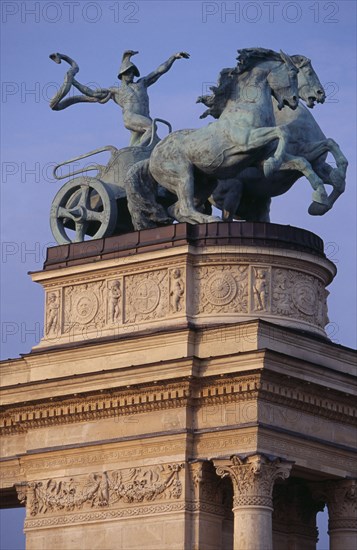 HUNGARY, Budapest, Heroes  Square erected to mark the 1000th anniversary of the Magyar conquest.  Statue of horse drawn chariot on the Millennary Monument. Eastern Europe