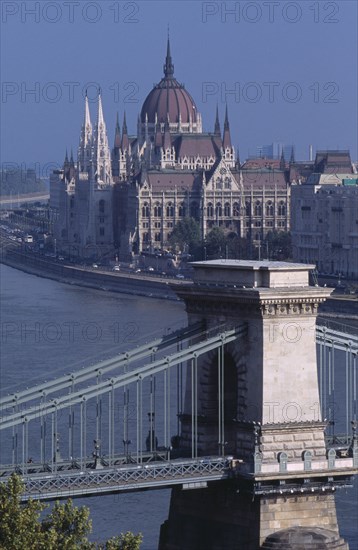 HUNGARY, Budapest, Cityscape.  View towards Parliament building with part view of Chain Bridge in the foreground. Eastern Europe