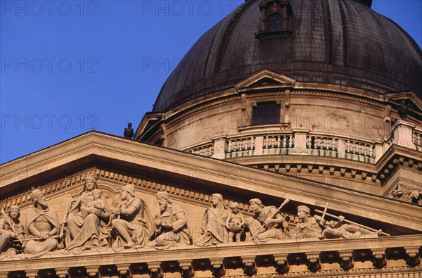 HUNGARY, Budapest, Basilica of St Stephen.  Part view of carved portico and dome of roof. Eastern Europe