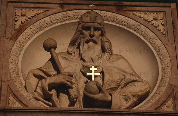 HUNGARY, Budapest, Basilica of St Stephen.  Detail of relief carving above entrance doorway. Eastern Europe