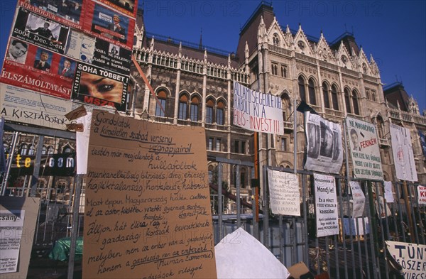 HUNGARY, Budapest, "Hand-written posters and signs attached to railings outside Parliament to demonstrate against Socialist leader Ference Gyurcany, 50 years after 1956 uprising againist communist rule. "