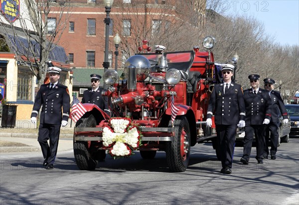 USA, New Hampshire, Keene, Fire truck at the funeral of a fireman.