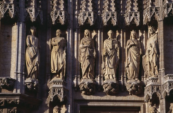 BELGIUM, Brabant, Brussels, Grand Place. Hotel de Ville detail of facade decorated with statues representing the Dukes and Duchesses of Brabant. Stadhuis 15th Century