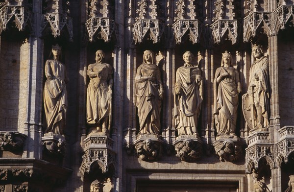 BELGIUM, Brabant, Brussels, Grand Place.  Hotel de Ville  detail of facade decorated with statues representing the Dukes and Duchesses of Brabant.  Stadhuis 15th Century