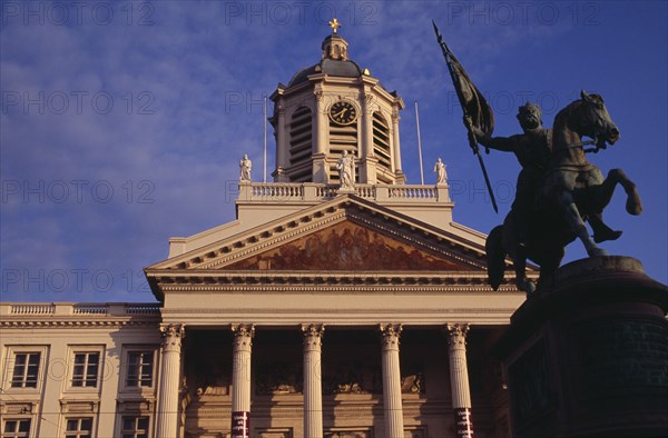 BELGIUM, Brabant, Brussels, Royal Square.  Exterior facade of Church of Saint James with equestrian statue of Godfrey of Bouillon leader of the first crusade in 1096 in foreground.