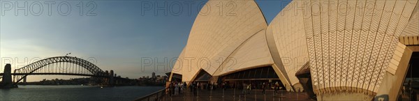 Australia, New South Wales, Sydney, Panorama Of Sydney Opera House And Harbour Bridge At Sunset